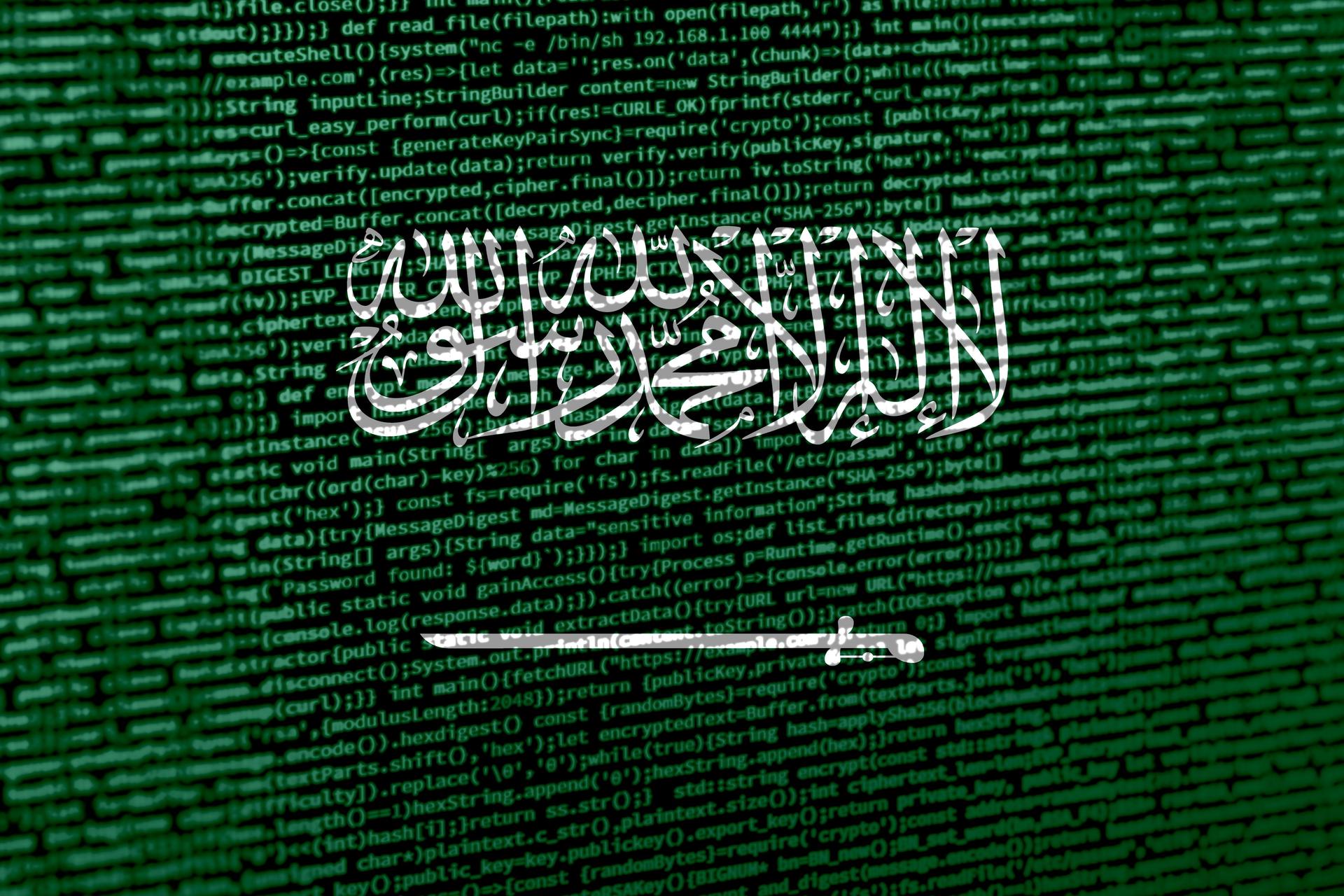 Flag of Saudi Arabia over digital code. Concept of cybersecurity, innovation, and digital infrastructure in Saudi Arabia. Modern tech development trends in Saudi Arabia. Programming, digital sovereig